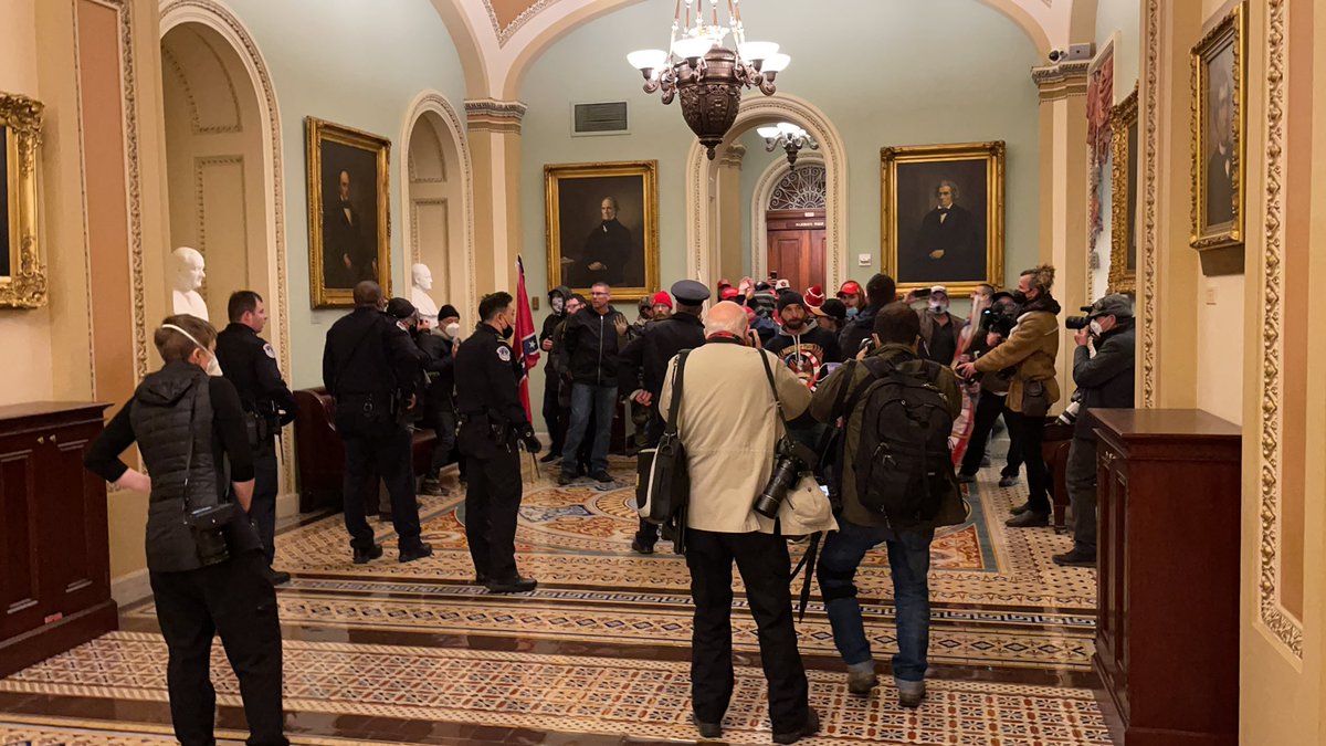 Protesters have breached the Capitol. They’re outside the Senate chamber
