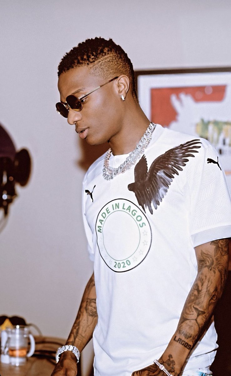 Wizkid as football club jerseys Manchester United