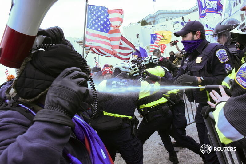 Supporters of President Donald Trump clash with police officers in front of the U.S. Capitol Building. More photos:  http://reut.rs/38mioh8&nbsp;  Stephanie Keith