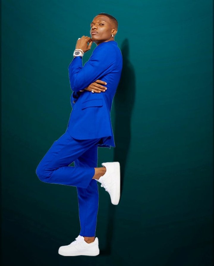 Wizkid as football club jerseys Manchester United