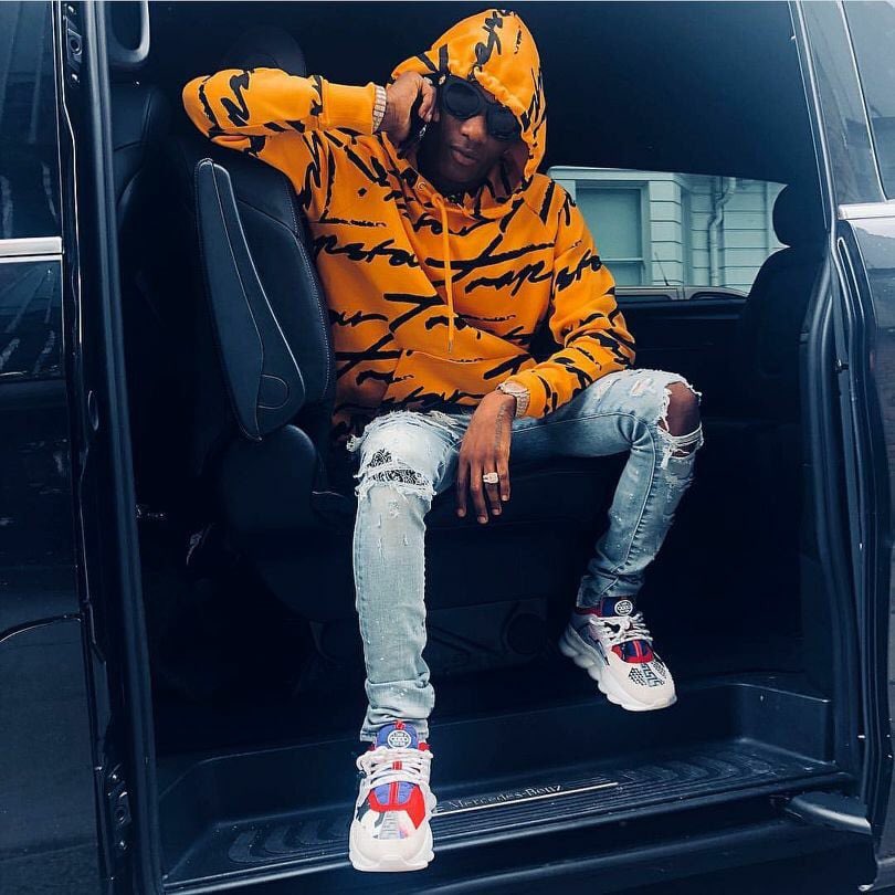 Wizkid as football club jerseys Manchester United