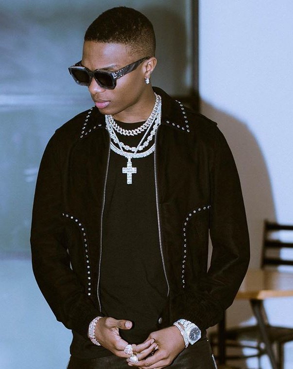 Wizkid as football club jerseys Manchester United