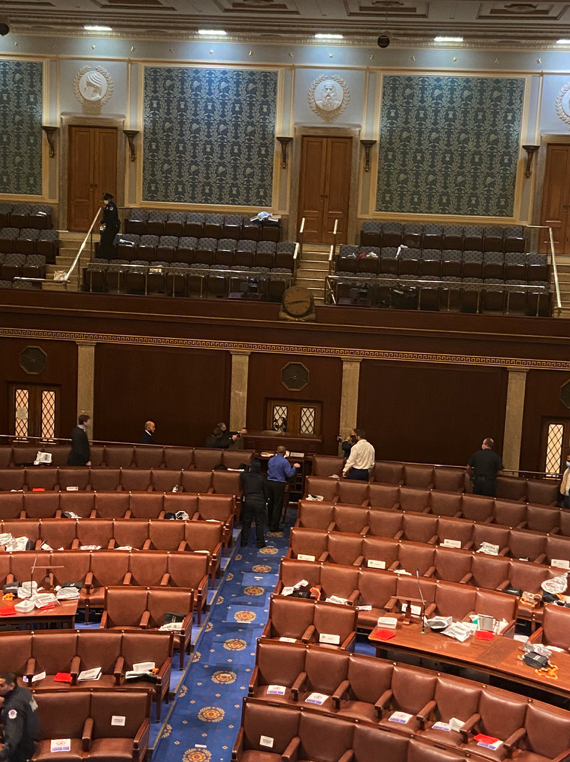 Charles_Lister's tweet photo. @MarquardtA @igorbobic @realDonaldTrump Armed stand-off in the #Senate chamber -- multiple police have guns drawn, staff hiding under chairs &amp; [unconfirmed] reports of shots fired. https://t.co/XFr4Etjh6h