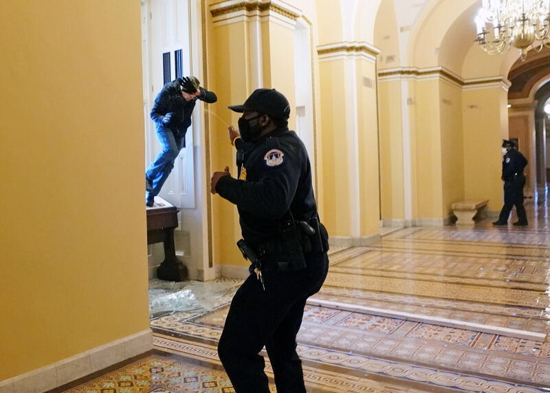 A U.S. Capitol police officer shoots pepper spray at a protestor attempting to enter the Capitol Building. More of our latest photos:  http://reut.rs/38mioh8&nbsp;  Kevin Dietsch