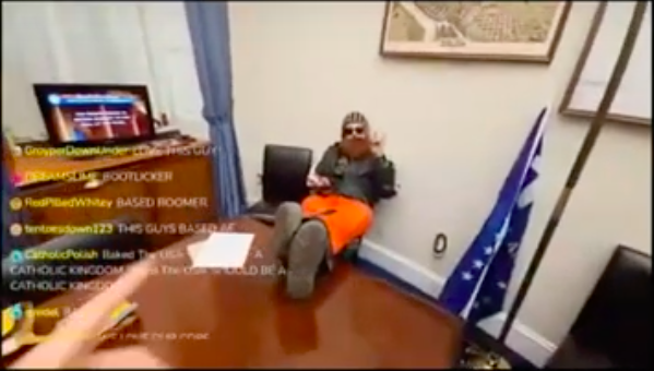 Protesters are streaming as they break into politicians' offices and put their feet up.