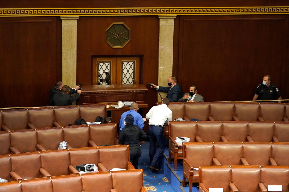 Guns drawn as part of an armed standoff INSIDE the House Chamber. 

Unbelievable photo from <a href="/drewangerer/">Drew Angerer</a> and <a href="/GettyImagesNews/">Getty Images News</a>.