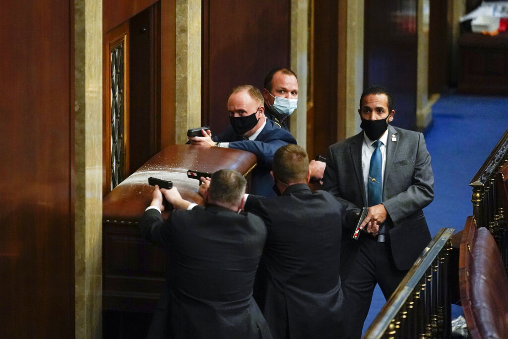 KaylynHlavaty's tweet photo. The photos from talented and brave @AP photographers in the midst of chaos really tell the story about what's happening right now in the #Capitol. https://t.co/6cfkFdtRqV