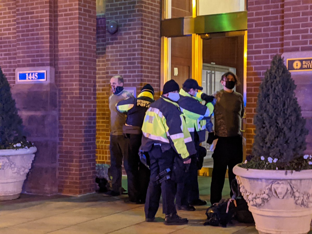 D.C. police arrest about a dozen Trump supporters for curfew violation on New York Avenue two blocks distance from the White House complex just before 8 p.m.