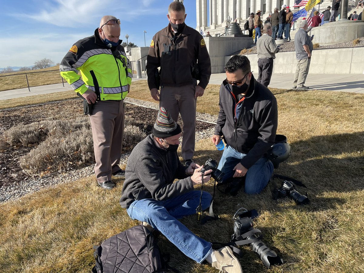 Salt Lake Tribune photographer Rick Egan has been pepper sprayed by people here upset he was documenting the event.  @sltrib  #uptol