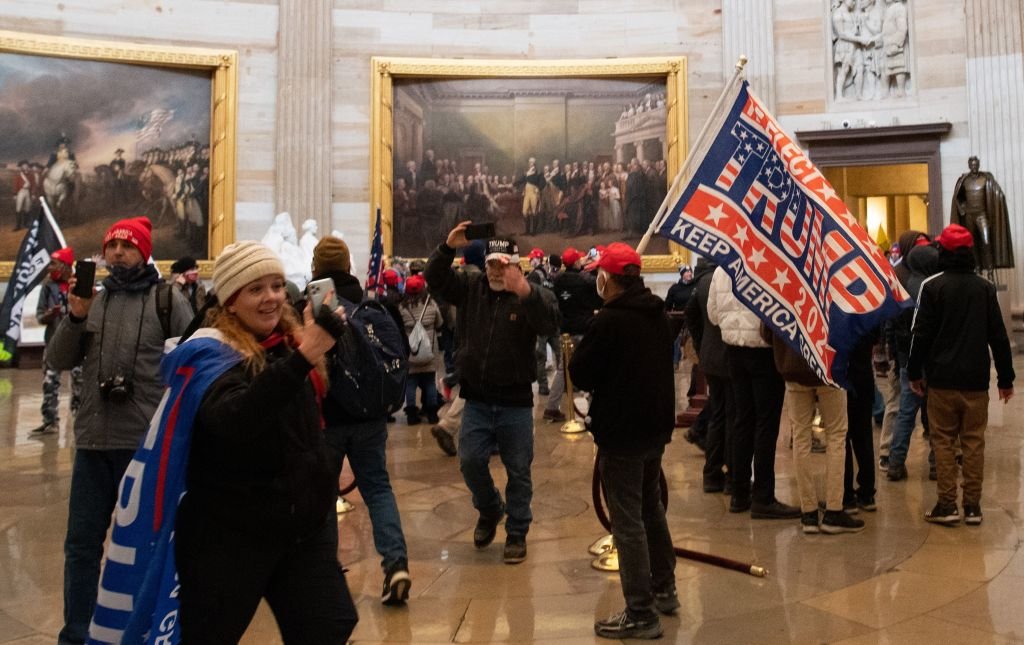 Bossip's tweet image. MAGA Madness: White Terrorist Trump Supporters Violently Storm The United States Capitol Building Because He Incited Them To Do So, Soup Cookie Coup KKKommences

(Image via JOSEPH PREZIOSO / Getty/SAUL LOEB / Getty/)

bossip.com/1990338/white-…