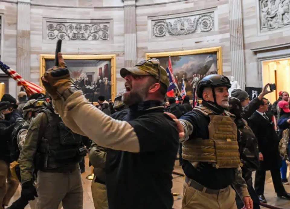 Craigd15's tweet photo. Who turns up to protest peacefully in full army fatigues?! #protest #CapitolBuilding #whiteprivilege https://t.co/ANBoMF5d0C