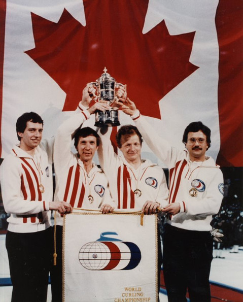 ABSportsHall's tweet photo. Extra challenging #SpotTheDiffernce!
Our Honored Team Ed Lukowich Curling Team Hoisting the WCC Trophy
Five changes have been made to this shot!
Can you spot the changes?
*Hint: Do vertical stripes make you look taller?
@CurlingCanada @Curling_Alberta
#YourHeroesYourHall https://t.co/6kPvldPJgT