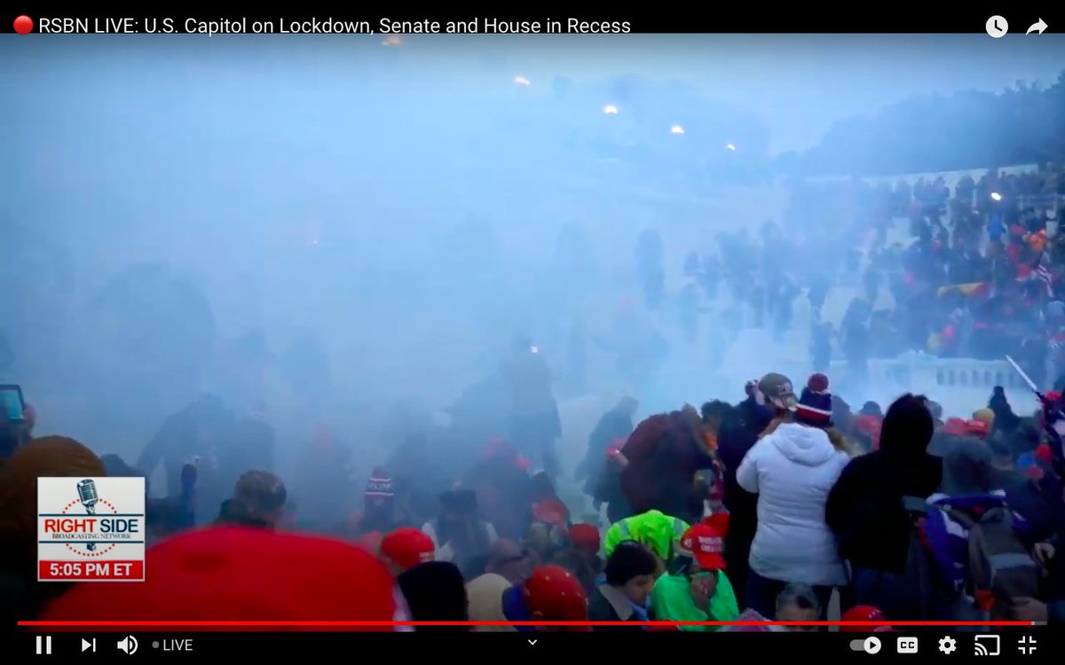 Protesters trying to break into the doors again. Riot cops are firing flashbangs and tear gas.