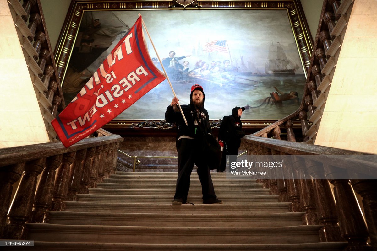 Members of the Federal Bureau of Investigation (FBI) swat team patrol the Longworth House Office building after a joint session of Congress to count the votes of the 2020 presidential election took place in Washington, D.C., U.S., on Wednesday, Jan. 6, 2021.