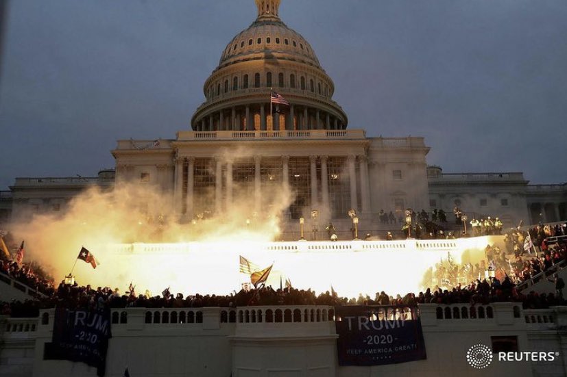 idreesali114's tweet photo. An explosion caused by a police munition is seen as Trump supporters converge on the Capitol Building in Washington, January 6, 2021. 📷 @LeahMillis https://t.co/hPaXH1sMwz