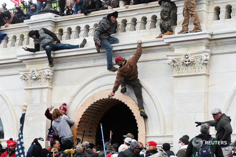 Supporters of President Trump climb the walls of the Capitol Building, and more scenes as the siege unfolded:  http://reut.rs/2MBYaHz&nbsp;  Stephanie Keith