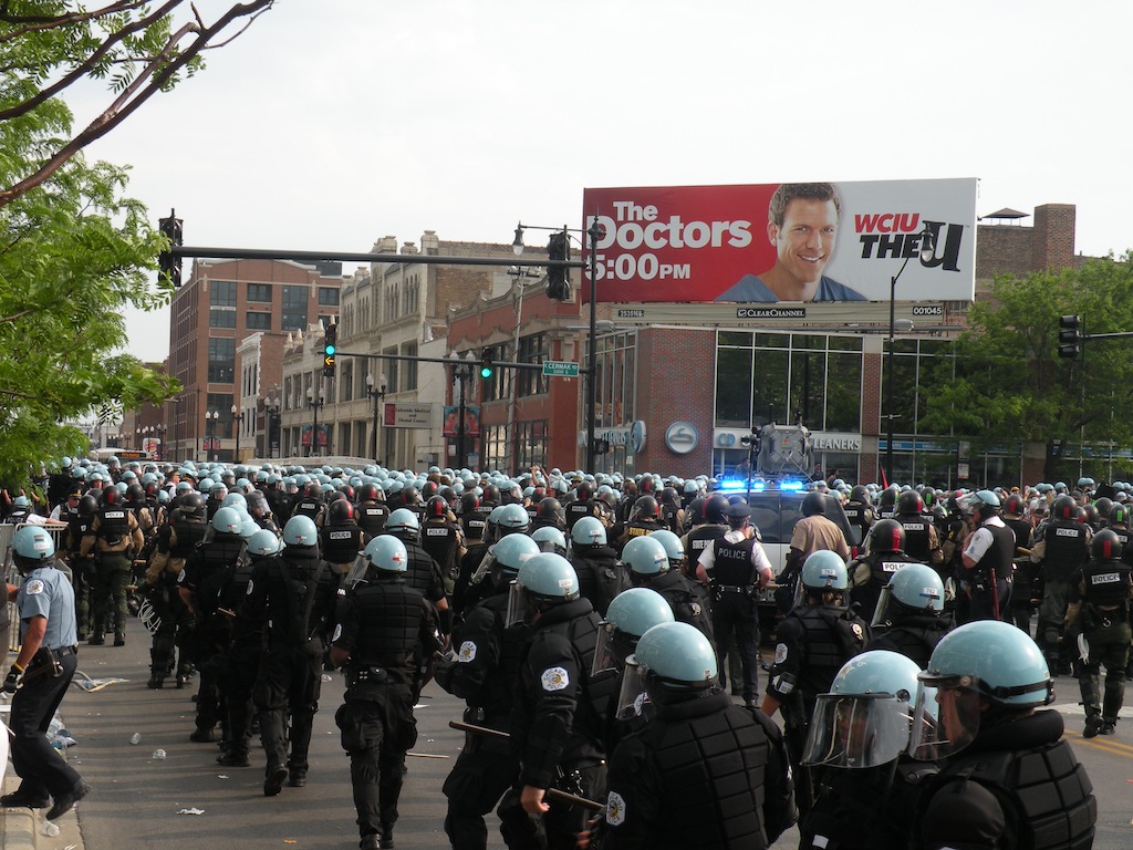 markcassello's tweet photo. When activists marched in Chicago against imperialism and corporate influence over the American political system in May 2012 (Photo 1), this was the police presence on hand to meet them (Photo 2). What accounts for the difference in security for today's demonstrations in D.C.? https://t.co/xQpd5BV5jK