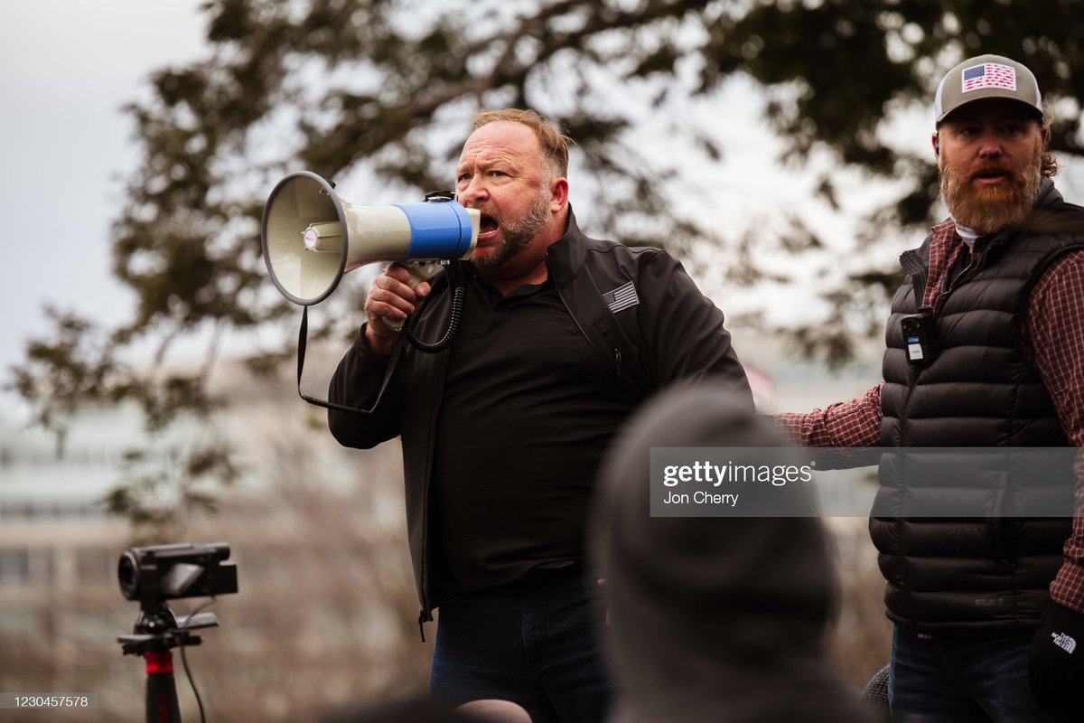 Alex Jones, the founder of right-wing media group Infowars, addresses a crowd of pro-Trump protesters after they storm the grounds of the Capitol Building on January 6, 2021 in Washington, DC.