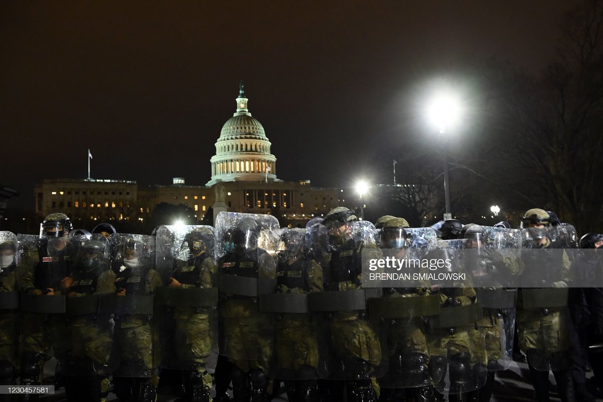 Riot police prepare to move demonstrators away from the US Capitol in Washington DC on January 6, 2021.