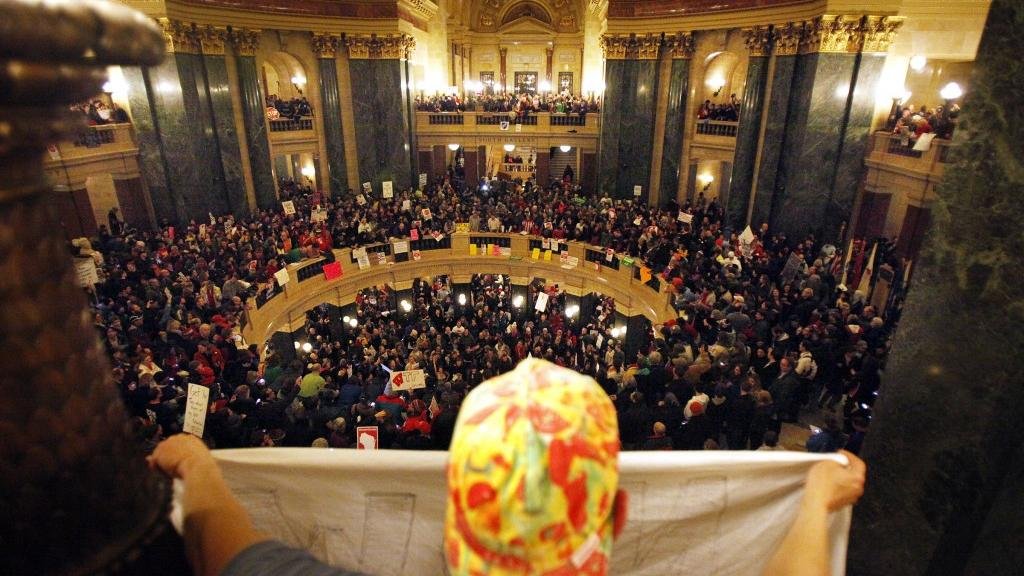 ScottMGreer's tweet image. In 2011, left-wing protesters stormed the Wisconsin State Capitol while it was in session. Curiously, no one called it a terrorist attack