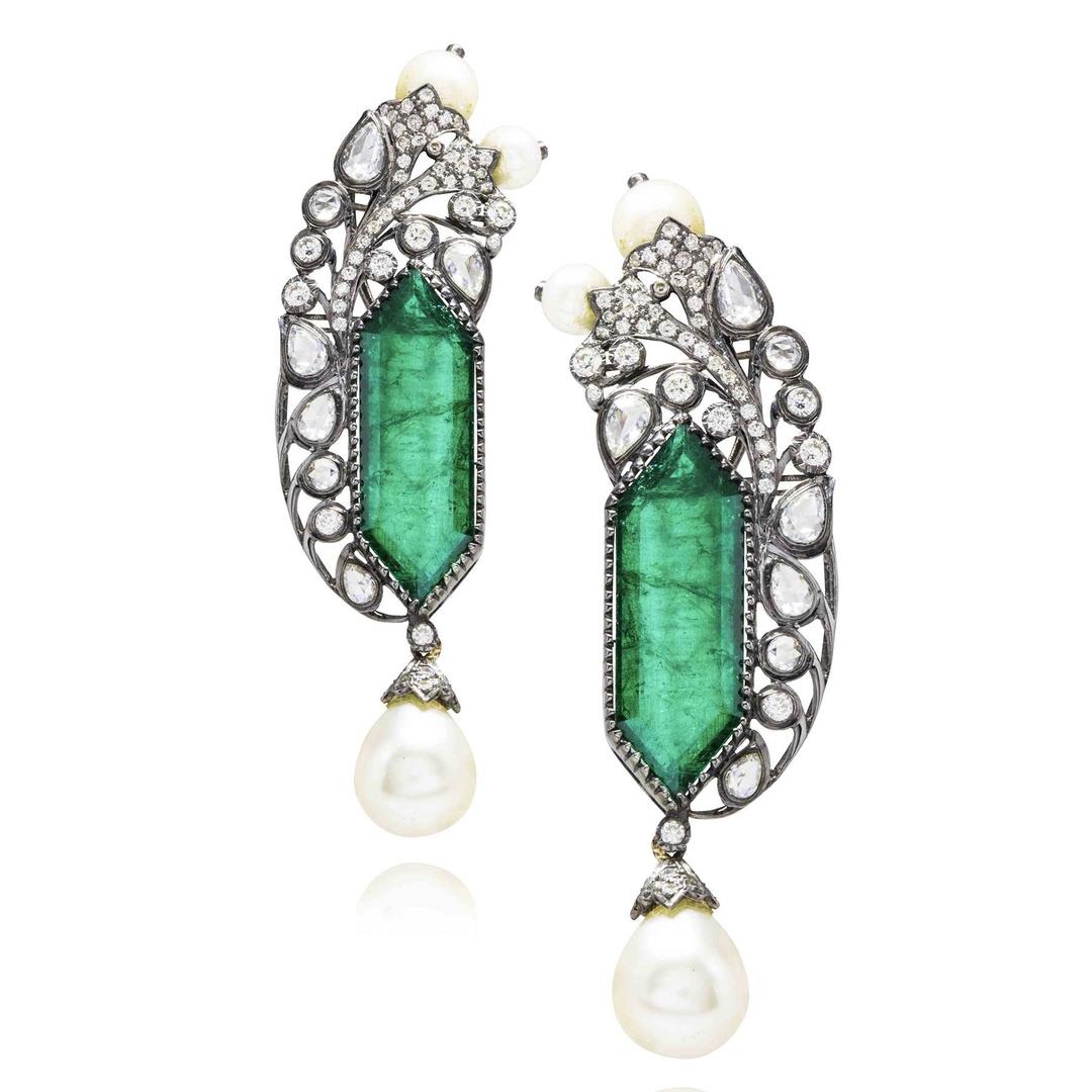 Two pairs of emerald earrings from Amrapali. The carving on the left is amazing, and the design on the right is amazing, and I love Amrapali.