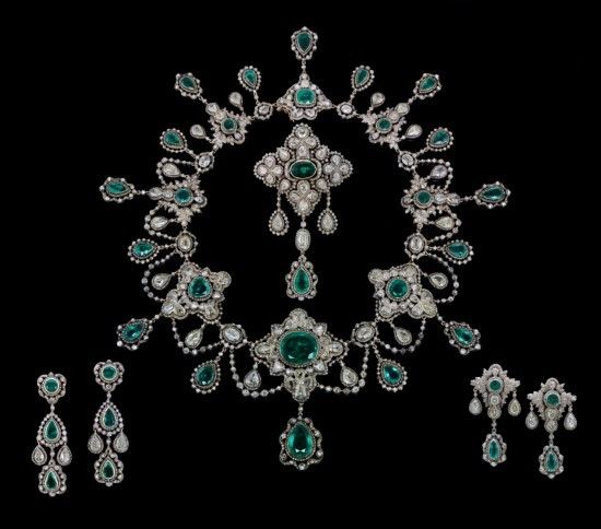 An antique emerald and pearl parure.