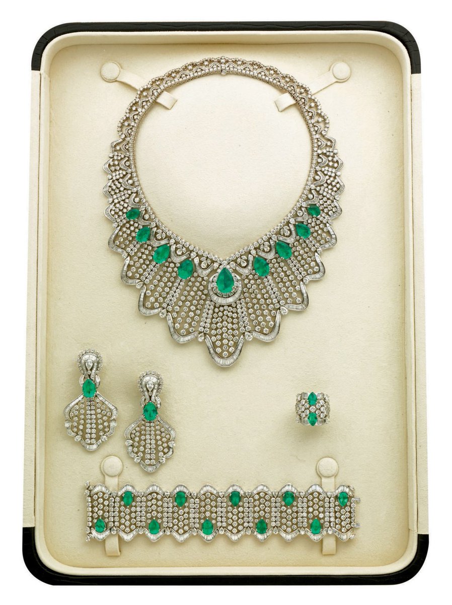 Another emerald parure, also antique. Love the ribbon of baguette cuts along the bottom edge of the necklace.