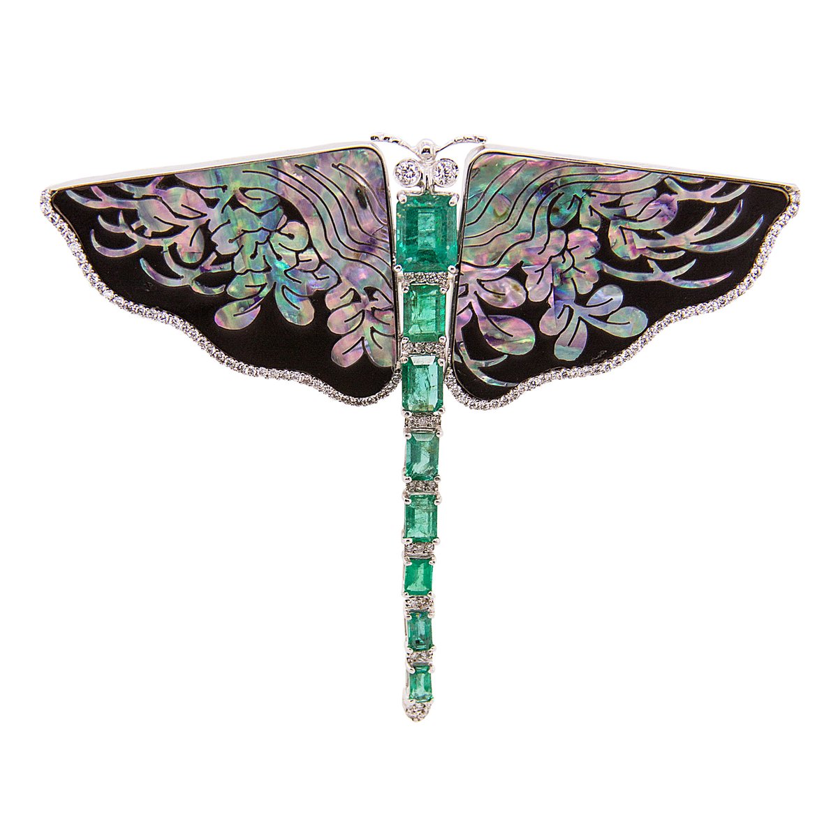 The Furmanovich brooch again, because it's stunning. The wings are traditional Asian lacquer work with inlaid abalone shell, with diamonds, and the body is emeralds.