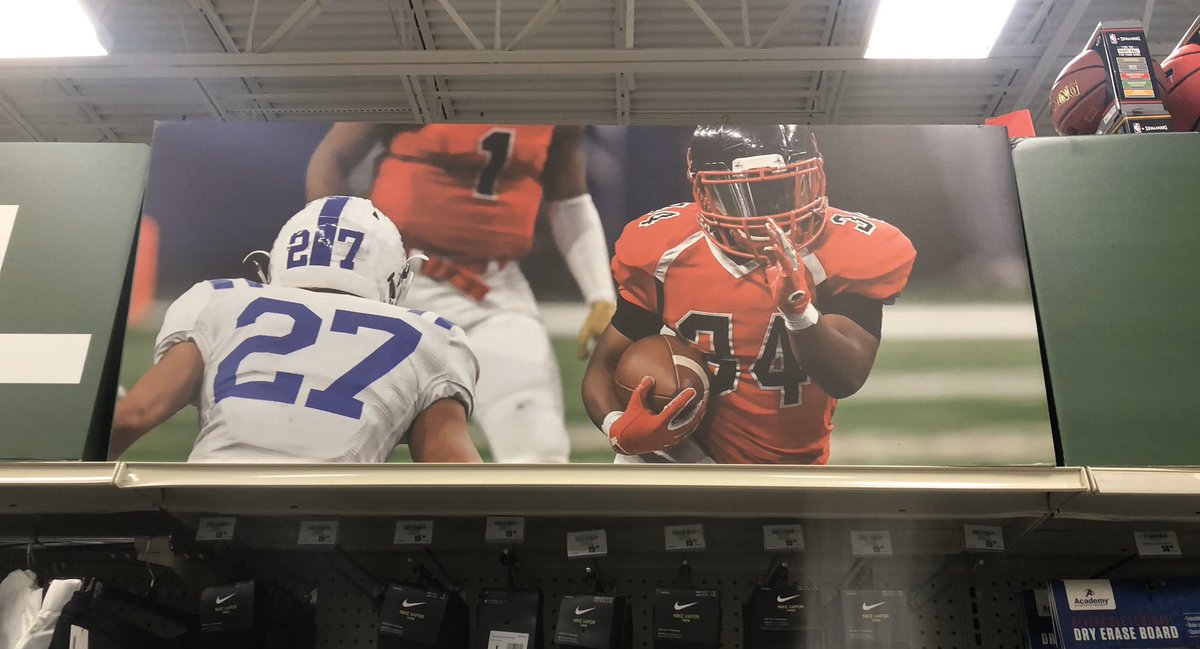 CoachGilpin's tweet photo. Check out the cool pictures/posters up in the Academy Sporting Goods Store in McAllen of former Patriot FB stars WR Mikey Garcia and DB Elias Delgado!!!!! Really neat to see!!!!!
#blueVlife https://t.co/QL0FYkjaT5