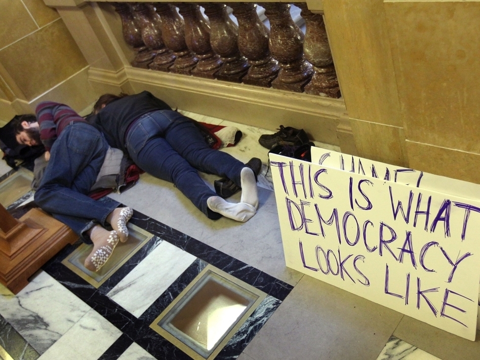 MattBatzel's tweet photo. In 2011, protesters stormed the Wisconsin Capitol, occupying it for weeks, sleeping overnight, yelling "Who's house? Our house!" The Media celebrated it. https://t.co/dXoFrS3QWk