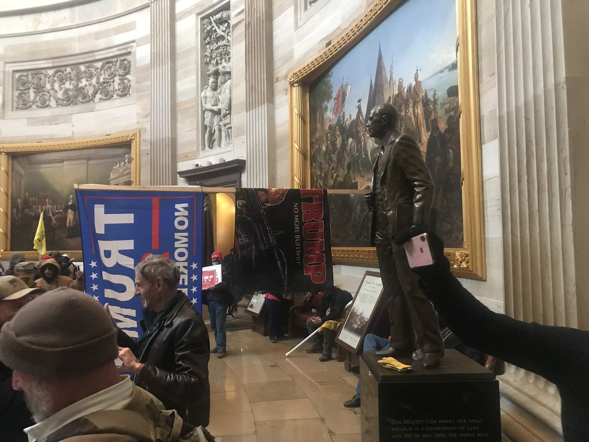 When they got inside the two security guards that had been guarding the door were lying prostrate on the ground. They found it odd that only two guards had been guarding that door.