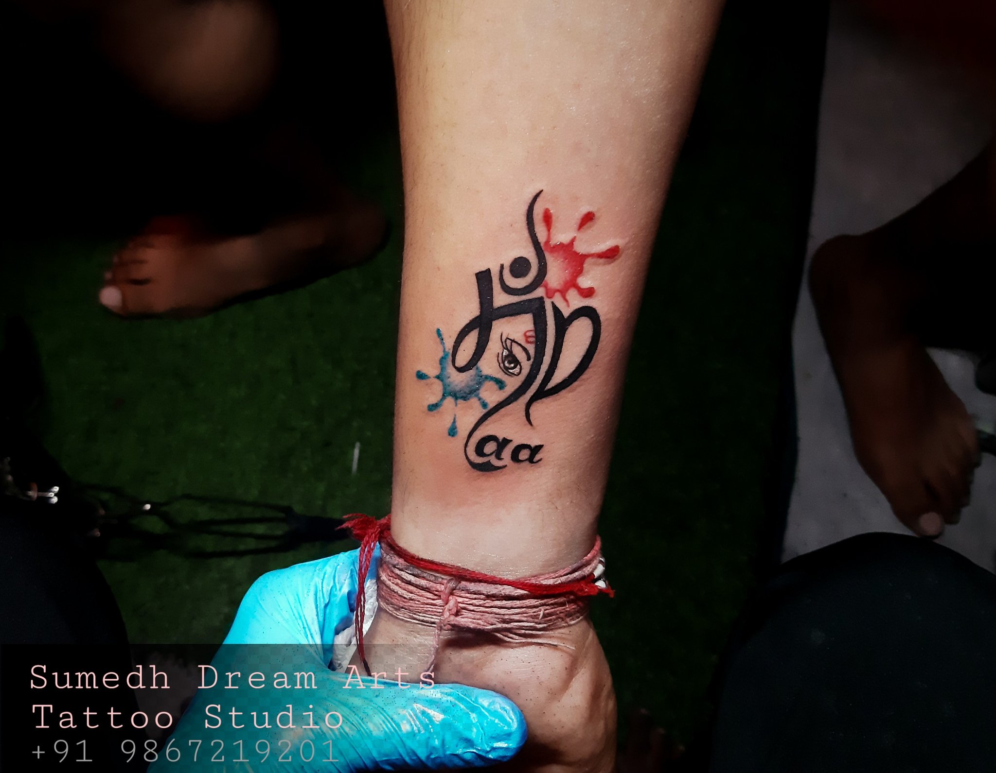Lord Ganesha Tattoo with Om Symbol | Famous tattoo artists, Cool tattoos,  Tattoos
