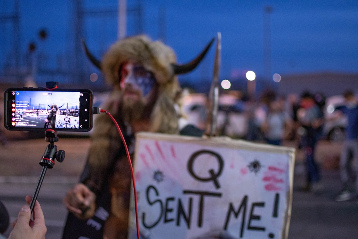 i_simonelli's tweet photo. Spoke with Jake Angeli at pro-Trump election protests in Phoenix in Nov. Jake posed with protesters and spoke with media outlets during the multi-day demonstration.
He explained that he was a follower of QAnon, as well as a shaman.
#capitolbreach #CaptiolBuilding https://t.co/Di3397LD19