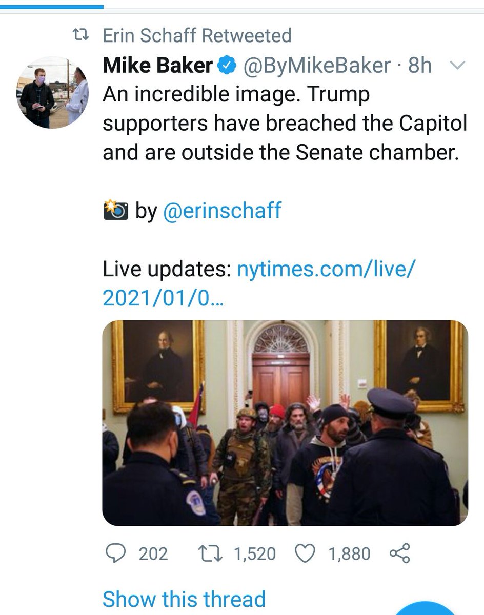7. I then found another person talking about another incredible image. Mike Baker of NYT. He credits Erin Schaff with the photo, also of the NYT. She must of been with the House member when this all took place, but was also there to snap one of Nancy when she returned.