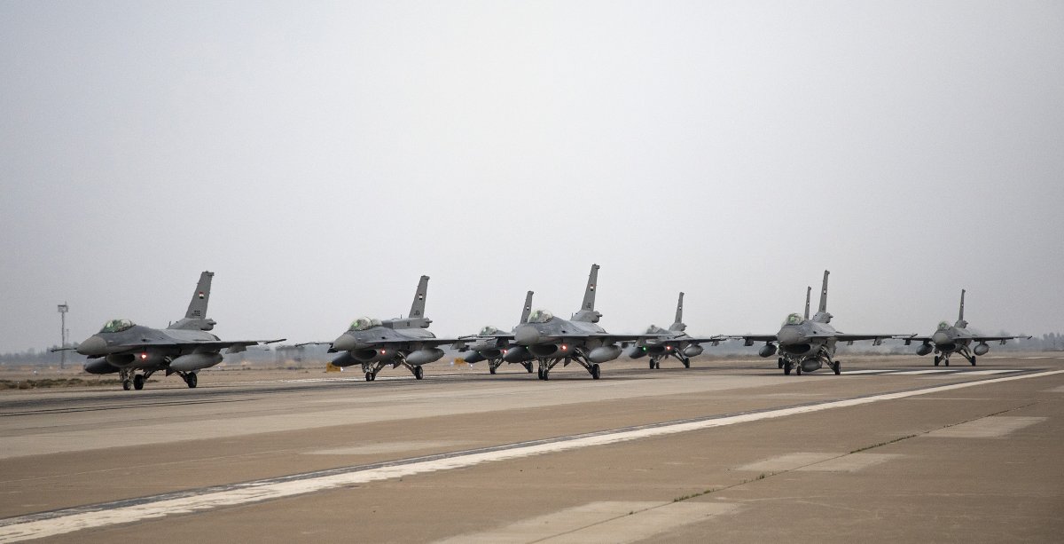 CJTFOIR's tweet photo. The Iraqi Air Force participated in a flyover during the 100th anniversary of the Army yesterday. They flew 23 of their F-16s and numerous other aircraft. The combat readiness of the pilots and F-16s continues to play a vital role in the mission to #DefeatDaesh. https://t.co/1KozR8sCbj
