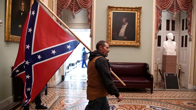 And of course there were Confederate flags. That goes without saying. The white supremacist racist pro-slavery flag of choice for so many.  #CapitolBuilding  #CapitolRiots
