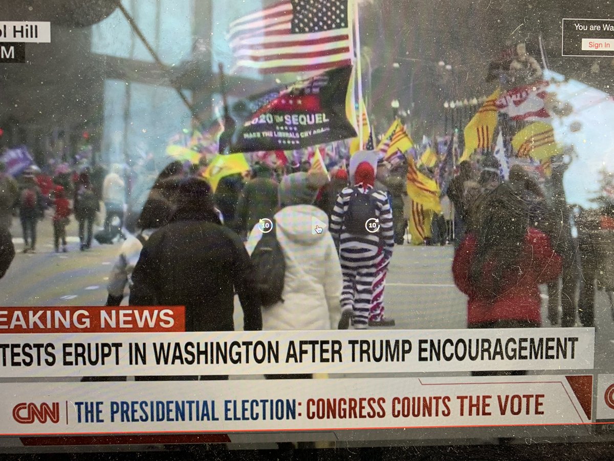 As I said emerging trends, this yellow one with red stripes is doing many things. This is the flag of South Vietnam. Oh boy. So we we have anti-communism and suport for US imperialism in one tidy package!  #CapitolInsurrection  #CapitolHill  #CapitolRiots