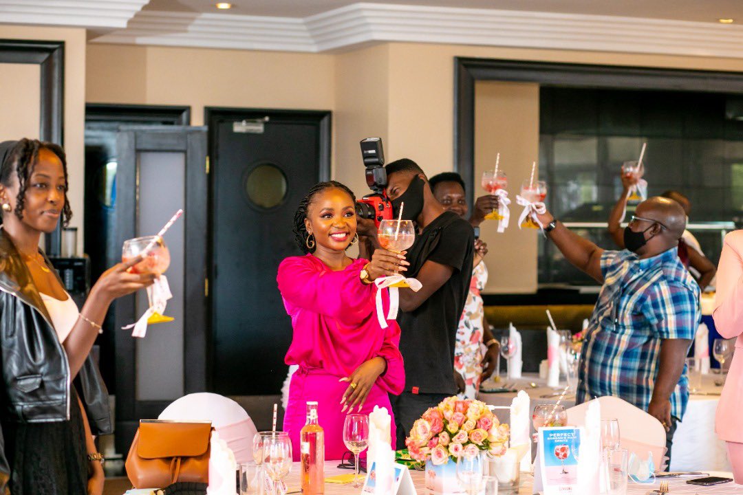 Guests make a toast at the A bottle of Gordon's Premium Pink Distilled Gin Launch