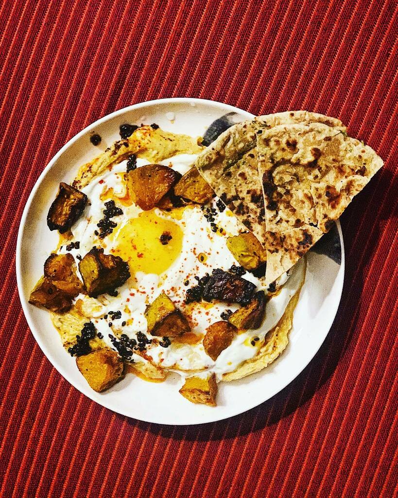 incurablecook's tweet photo. Hummus, garlic-y yogurt, roasted pumpkin, chonk, day old crisped naan. Could be Turkish eggs, but I don’t think it is. Hmmmm! https://t.co/uRN1ANv1n9 https://t.co/iIAsmjcEVi