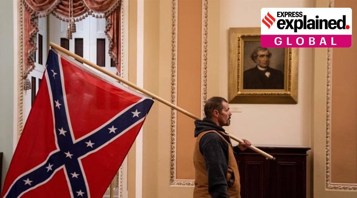 houlihan_rick's tweet photo. This is the saddest visual from yesterday's debacle. Over 150 years after the Civil War ended the flag of the Confederacy has been raised in the Capitol Building. This feels like the beginning of the end. https://t.co/8KYZZfLBB0