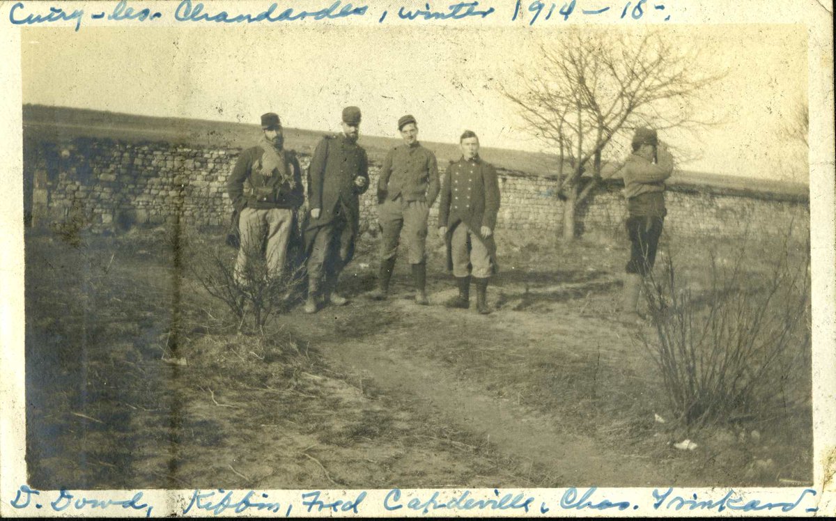 (4) Photograph of five American members of le  #Légionétrangère, posing on a dirt road in the commune of Cuiry-lès-Chaudardes, 1914-1915. Pictured are (L to R): Denis Dowd of  #Brooklyn; Kiffin Rockwell; Fred Capdevielle of  #NYC; Charles Trinkard of  #Brooklyn; and an unknown  #poilu