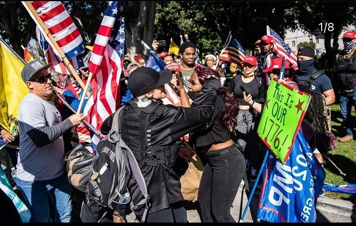 BlackNoChaser's tweet photo. Trigger Warning- these images are infuriating. Photographs and Repost by @rockmyworldrocky - 
“This woman was walking home. 
She lives on (redacted) St. , two blocks away from LA City Hall where a “Stop the Steal” MAGA Rally was taking place. #Losangeles #WashingtonDC https://t.co/sTKROmj4DM