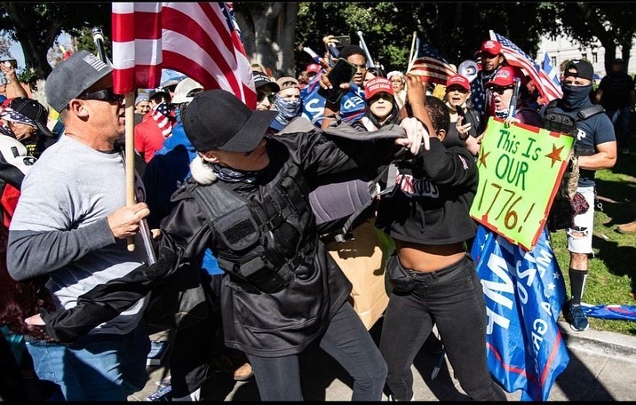 BlackNoChaser's tweet photo. Trigger Warning- these images are infuriating. Photographs and Repost by @rockmyworldrocky - 
“This woman was walking home. 
She lives on (redacted) St. , two blocks away from LA City Hall where a “Stop the Steal” MAGA Rally was taking place. #Losangeles #WashingtonDC https://t.co/sTKROmj4DM
