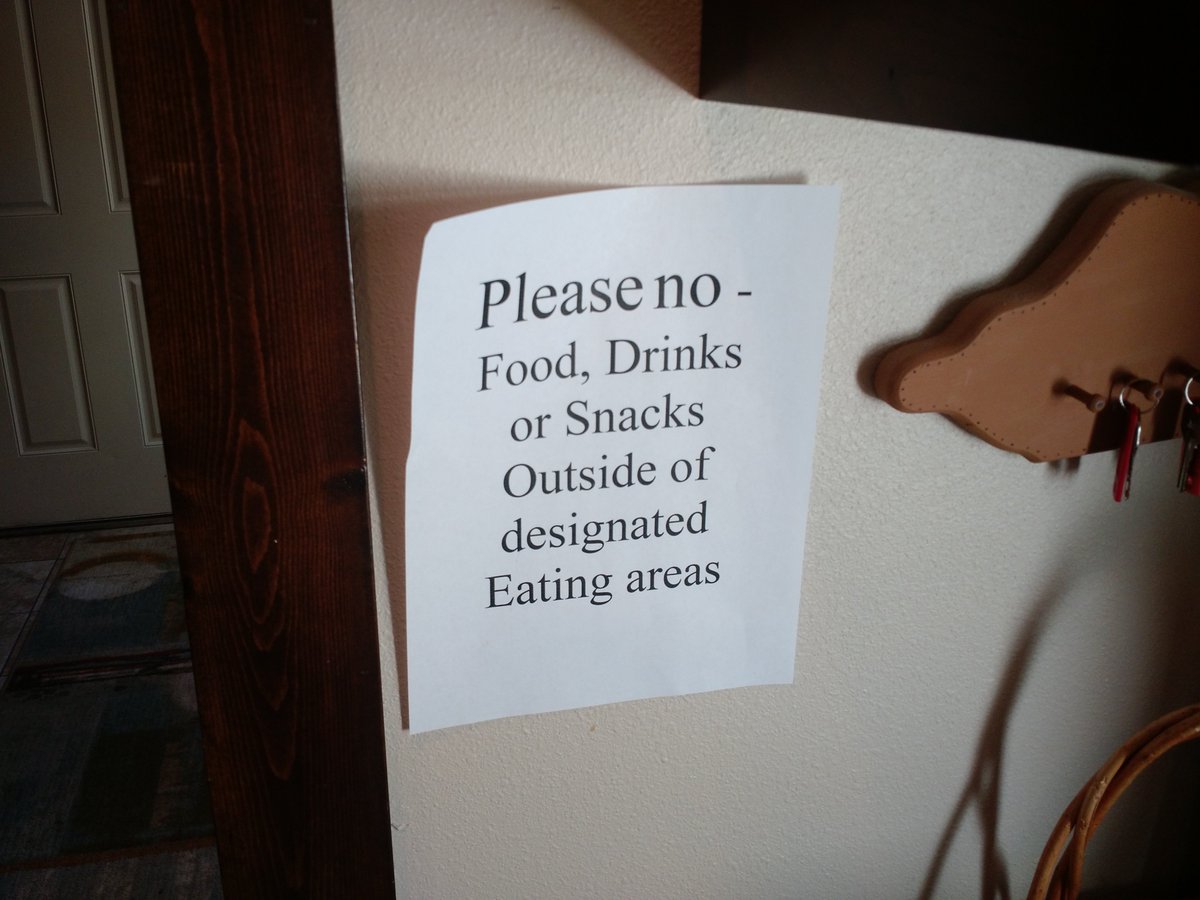 They really didn't want anyone eating outside of a couple of designated areas. There were at least half a dozen of these signs around the house.