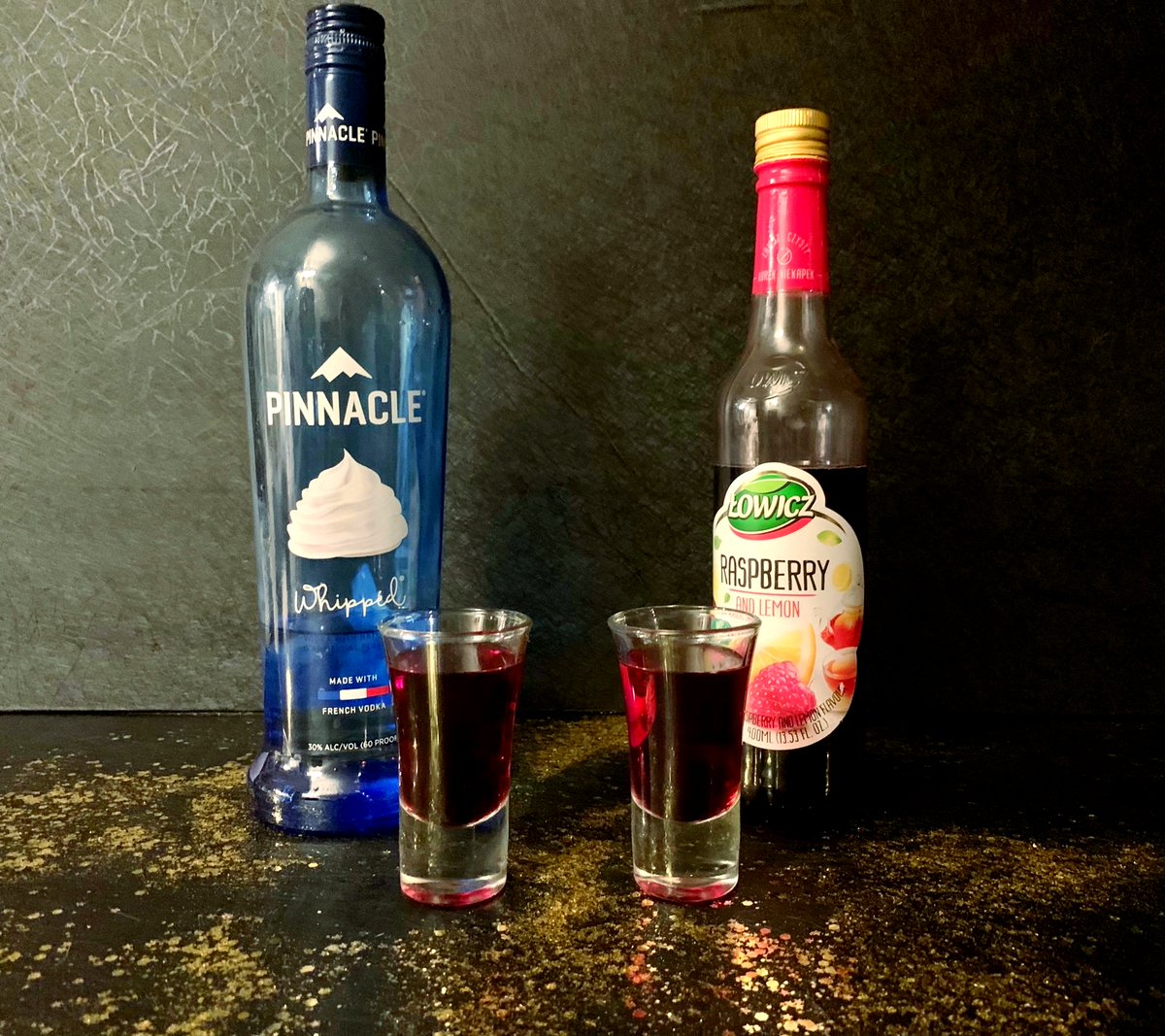 Shot of the Week - So damn good it got the whole damn show named after it this week

Creamin' in the New Year
3/4 Pinnacle Whipped Cream Vodka 
1/4 Lowicz Raspberry &amp; Lemon Syrup

So good, so tart, so creamy tasting