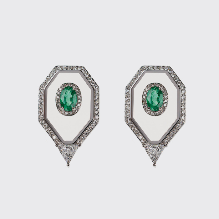 Nick Koulis is another amazing young jeweler, and emeralds are one of his favorites. The settings on the right? Those emeralds are held within the outer ring with TRANSPARENT ENAMEL.