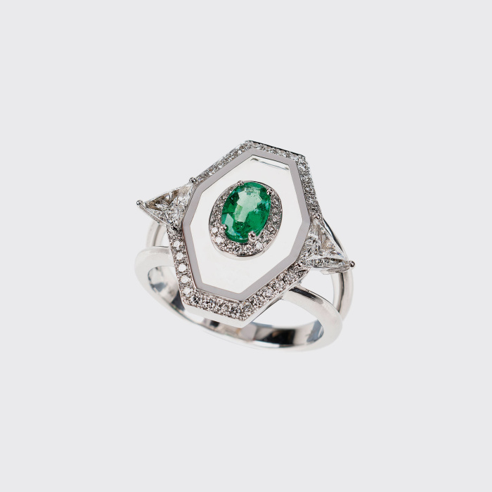 Nick Koulis is another amazing young jeweler, and emeralds are one of his favorites. The settings on the right? Those emeralds are held within the outer ring with TRANSPARENT ENAMEL.