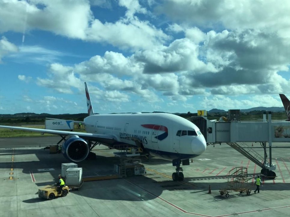 Flying back to #BVI.  Short delay well explained &amp; welcome as <a href="/British_Airways/">British Airways</a> explained they are loading vaccines donated from 🇬🇧 to Turks &amp; Caicos. Vaccines for BVI will be coming soon (BVI will get the Oxford / Astra Zeneca one to fit our health system here).   <a href="/TCIGO/">TCI Governor</a>