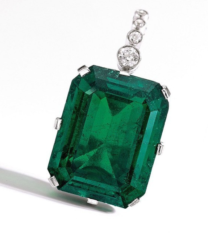 THE FLAGLER EMERALD! Set as a pendant, 35ct. Yum. Named after a robber baron scumbag friend of... Andrew Carnegie's, I think. Anyway, after he retired, for a hobby, he developed Florida. That's who Flagler Beach is named after.
