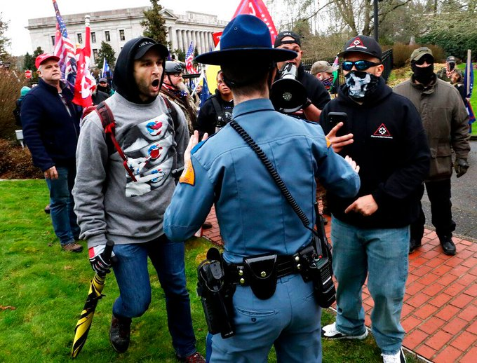 #MAGAt terrorists break through fences and try to storm the governor's mansion in Washington state.

Gee, would be nice if we had a government that went ahead and called them what they are, domestic terrorists and arrest them all. Why aren't they acting?

#ThisIsntOverYet #Cult45